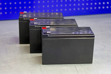 An electric rechargeable battery for installation in an uninterruptible power supply.