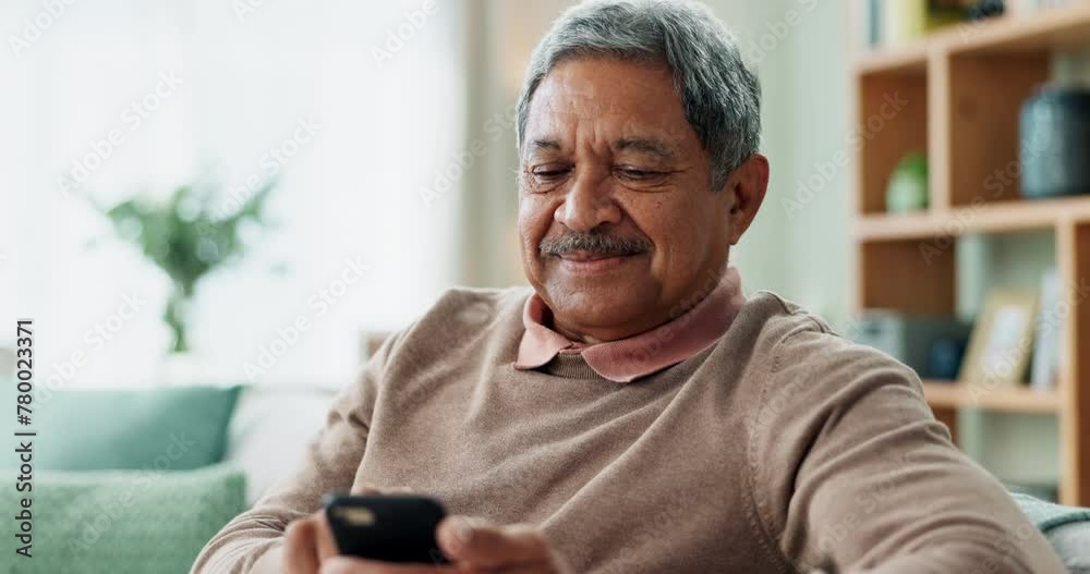 Poster phone, communication and senior man on sofa with smile, online chat and scroll on internet in home. 