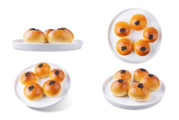 Red bean paste buns with black sesame seeds sprinkles on a white isolated background