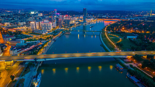 Sunset over Downtown Belgrade viewed behind the Sava river in Se