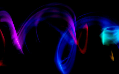 Abstract colorful irregular lines background. Long exposure. Light painting photography