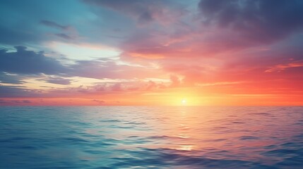 The image features a serene ocean sunset with calm waters reflecting the vibrant colors of the fiery sky