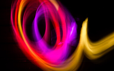 Abstract colorful irregular lines background. Long exposure. Light painting photography