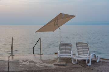 Metal steps leading to the Adriatic sea at the port of Piran, Slovenia
