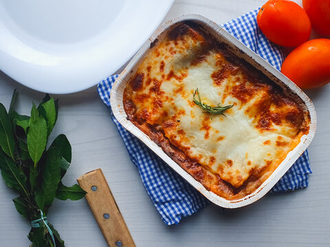 Bolognese lasagna in a baking dish on a table