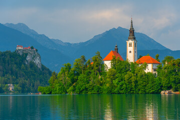 Fototapeta premium Assumption of Maria church and Bled Castle at lake Bled in Slove
