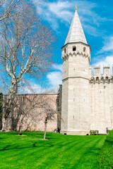 View of the walls and Topkapi Tower in Istanbul. Fragments of the Topkapi wall in Istanbul.