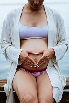 heart in pregnant woman's abdomen 