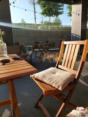 table and chair in the sun
