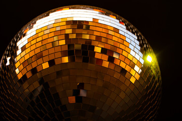 Closeup of discoball on black background