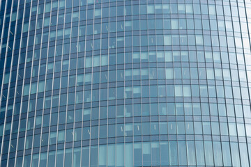 modern office building,modern office building with glass windows, building in the city,blue glass building