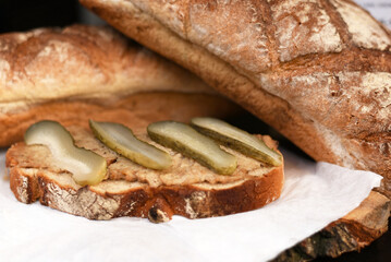 Sandwich with lard and pickled cucumber