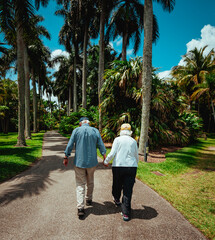 old couple walking in the park love 