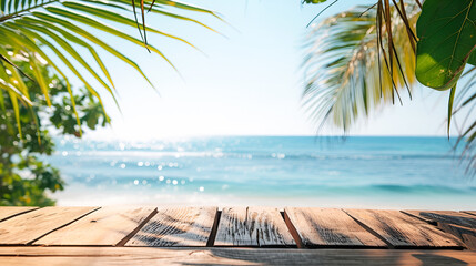 Empty wooden tabletop against the background of the blue sea, beach and palm leaves on a summer day. Background with copy space for product display.