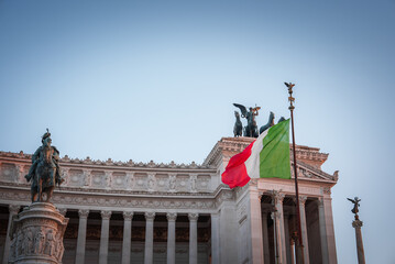 View Altare della Patria in Rome, Italy. Daytime shot with the national flag and equestrian statue....