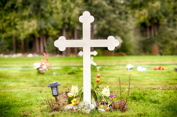 Large Christian Cross Grave Marker in Cemetery. 