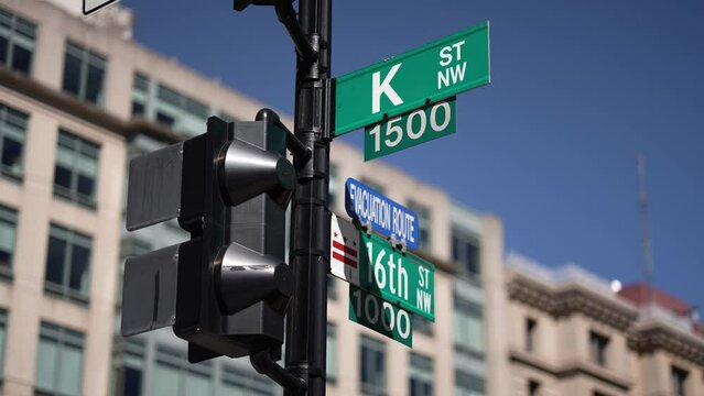 K street nw and 16th street nw street signs in downtown Washington DC symbolizing lobbying and corruption in nations capital