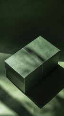Luxury green box with nature-inspired texture for elegant packaging. Minimalist style exudes sophistication.