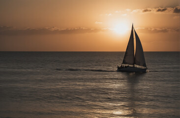 Fototapeta premium Sailboat at Sunset
