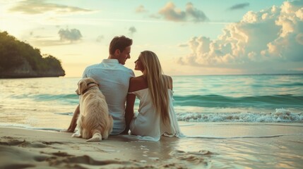 cute couple sitting in front of the beach with a puppy on vacation on a sunny summer day in high resolution and high quality HD