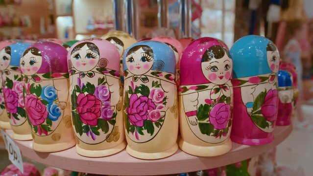 Matryoshka Dolls. Souvenirs Display Of Shop. Classic nesting dolls in traditional Russian clothes. Created of wood and richly painted Russian folk souvenirs are very beautiful and shine with brightly