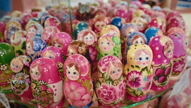Matryoshka Dolls. Souvenirs Display Of Shop. Classic nesting dolls in traditional Russian clothes. Created of wood and richly painted Russian folk souvenirs are very beautiful and shine with brightly