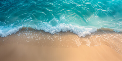 Fototapeta na wymiar Serene aerial view of ocean wave meeting sandy shore