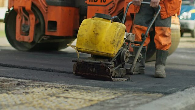 Road repair traffic transport worker street city machine paving