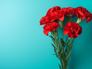 Dark background sets off a bouquet of red peonies
