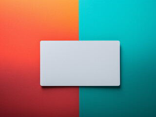 Top view of a blank business card on a vibrant, abstract background, offering space for text