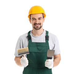 Male decorator with putty knife and brush on white background