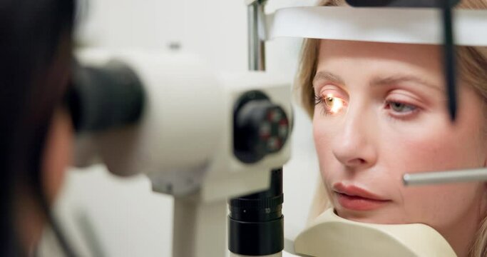 Closeup, eye exam or slit lamp in ophthalmology, optometry or visual healthcare assessment in clinic. Doctor, patient or led light on glaucoma testing equipment as lens consultation by retina expert