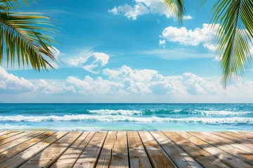 Deurstickers Summer tropical sea with waves, palm leaves and blue sky with clouds. Perfect vacation landscape with empty wooden table - generative ai © Nia™