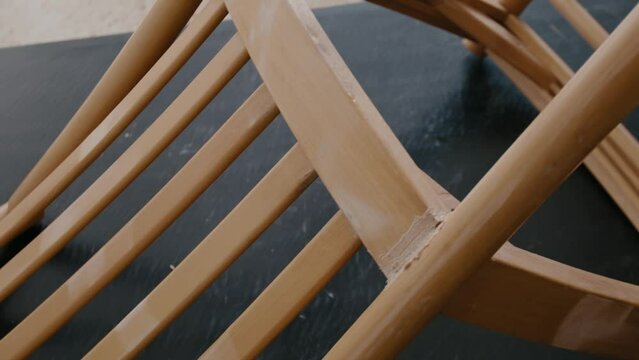 Restoration of a wooden chair. Close-up. Vintage things. High quality 4k footage
