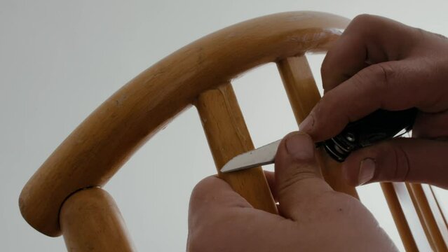 Restoration of a wooden chair. Close-up. Vintage things. High quality 4k footage