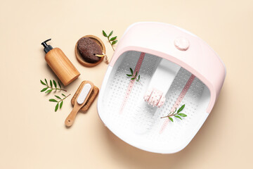 Set for foot massage on beige background