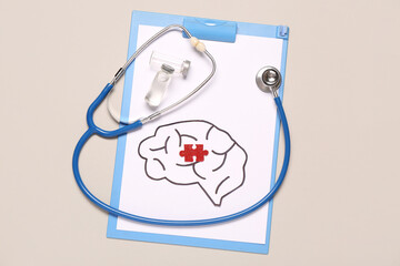 Clipboard with paper brain, puzzle piece, ampules and stethoscope on grey background. Multiple Sclerosis Awareness Month