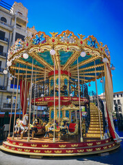 Carousel in the city general shot