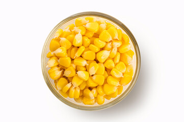 Corn seeds in a glass bowl on white background. Top view - 780157585