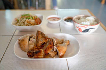 Grilled chicken and rice with papaya salad
