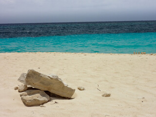 Fototapeta na wymiar caribbean beach with a big rock