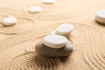 Tuinposter Spa stones on sand with lines. Zen concept © Pixel-Shot