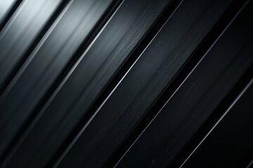 Obraz premium Elegant shot of sleek black ribbed metal panels with soft reflections, exemplifying modern industrial design and texture.