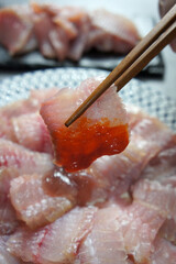 fermented skate sashimi with red chili pepper paste,korean food