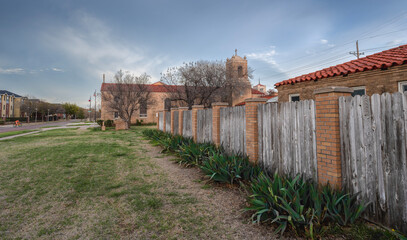 Fence at Spanish mission styled Saint Elizabeth’s Church in Lubbock, Texas, USA