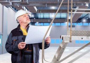An engineer inspects the ventilation system. Industrial air purification. Ventilation Design. HVAC