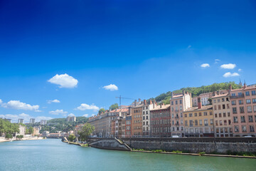 Panorama of Saone river and the Quais de Saone riverbank and riverside in the city center of Lyon, next to the Colline de Fourviere Hill