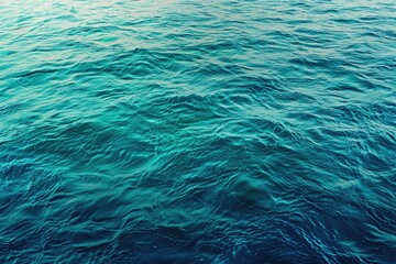 A gradient of ocean colors from deep sea green to clear turquoise - obrazy, fototapety, plakaty