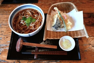 A view inside a Japanese soba restaurant that utilizes an old folk house. The old Japanese...