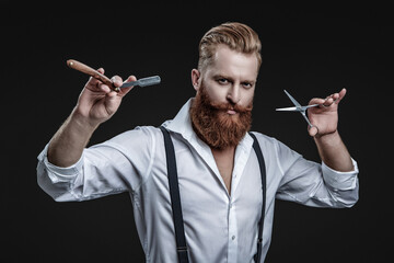 Haircut at hairdresser man. Barber making hairstyle. Advertising for barbershop. Hairdressing skills of man. Retro hairdresser holding razor and scissors isolated on black. Hairstylist serving - 780209535